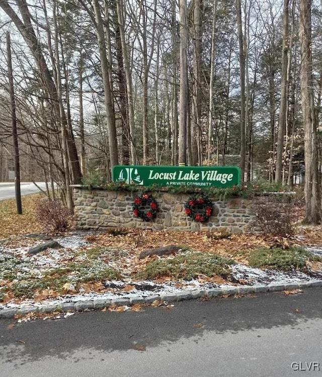 view of community sign