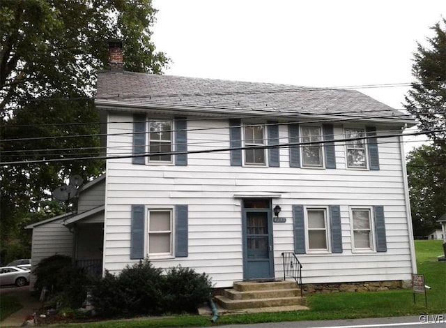 colonial house with a front yard