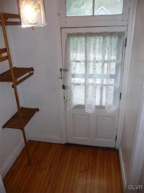 doorway to outside featuring hardwood / wood-style floors