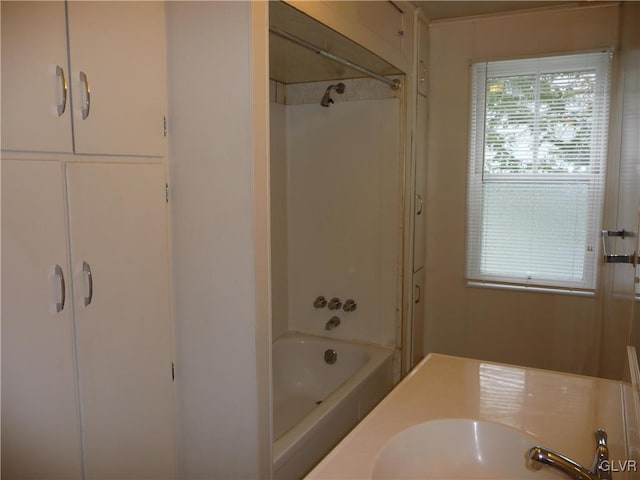 bathroom featuring sink and shower / bathtub combination