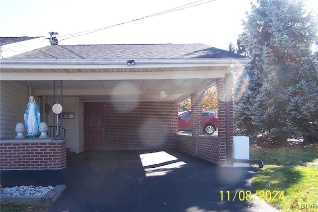 view of car parking with a carport