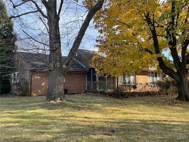 exterior space featuring a yard