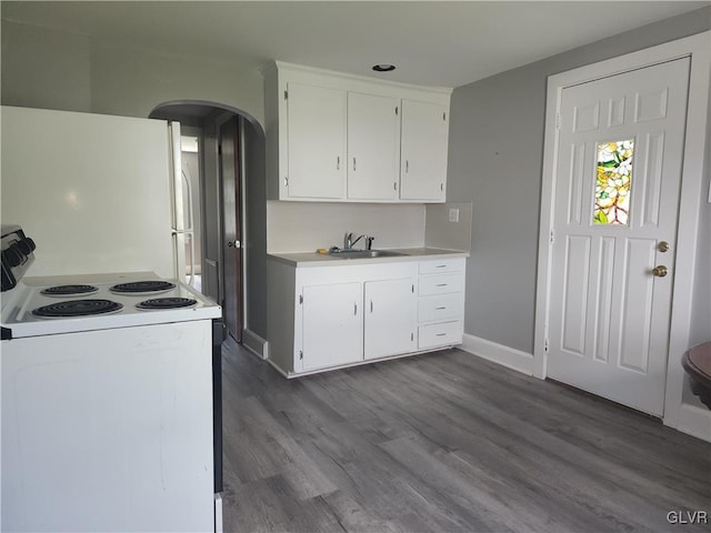 4400 Little Gap Rd, Lower Towamensing Tp, PA 18058 - kitchen featuring white appliances, arched walkways, a sink, light countertops, and white cabinetry