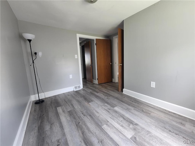 unfurnished bedroom with light hardwood / wood-style flooring