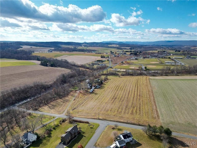 aerial view featuring a mountain view and a rural view