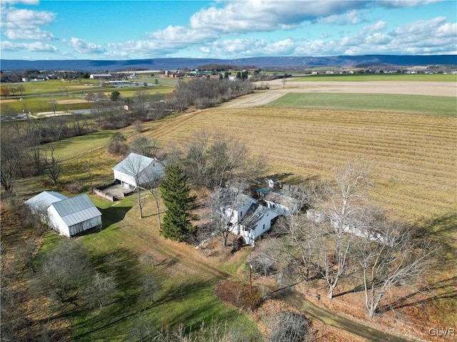 bird's eye view featuring a mountain view and a rural view