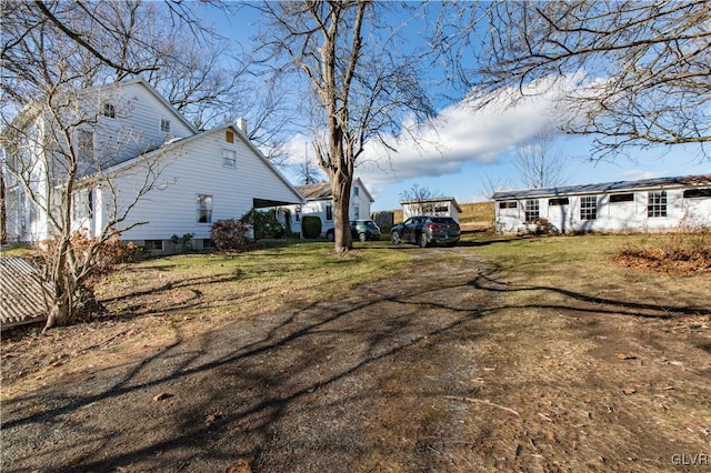 exterior space with a carport