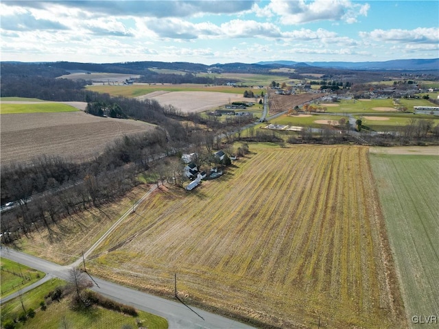 bird's eye view with a mountain view and a rural view