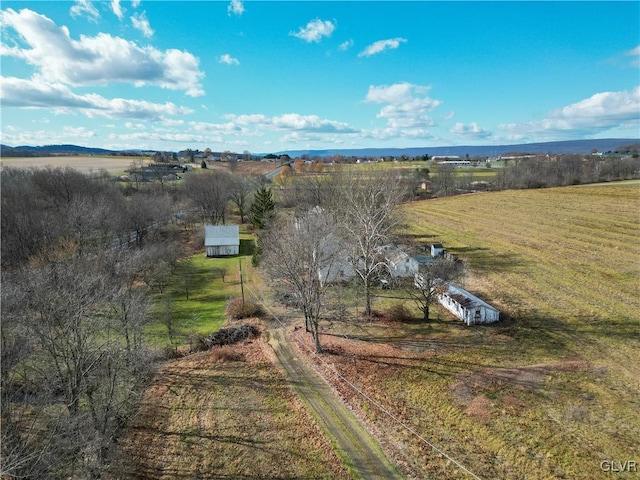 birds eye view of property featuring a rural view