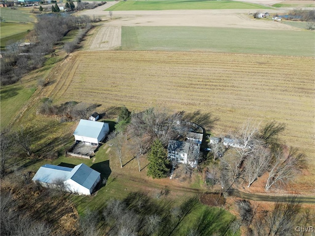 birds eye view of property with a rural view