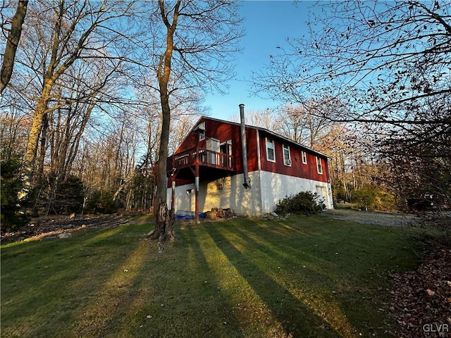 view of home's exterior featuring a lawn