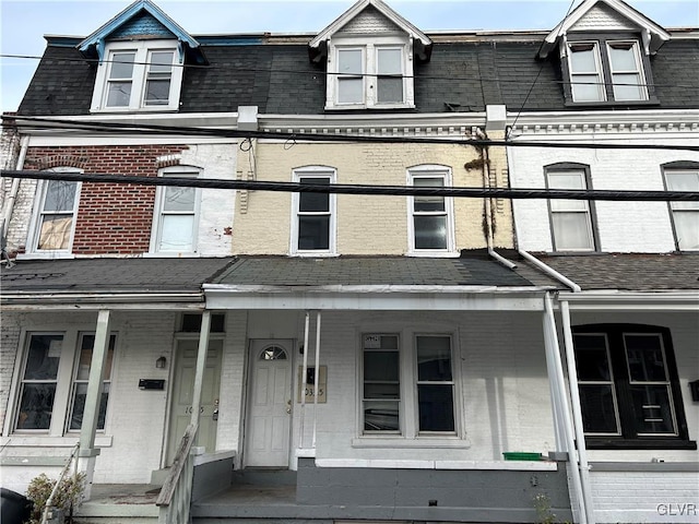 view of property with a porch