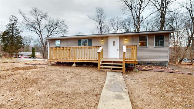 view of front of house featuring a deck