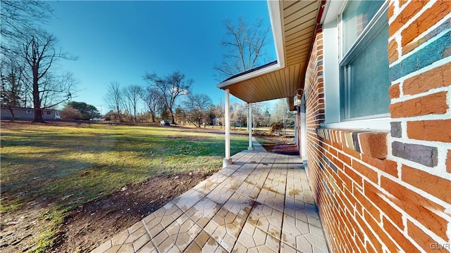 deck featuring a lawn