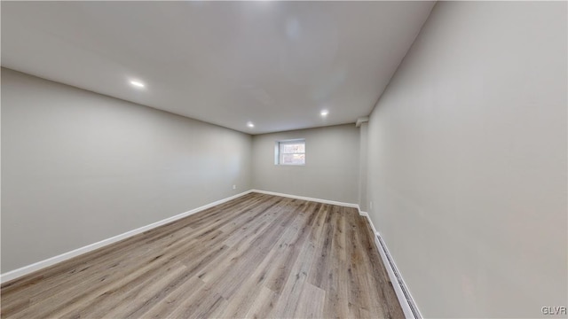 spare room featuring light hardwood / wood-style floors