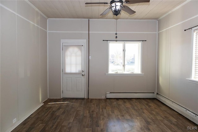 foyer entrance featuring baseboard heating, ceiling fan, dark wood-type flooring, and ornamental molding