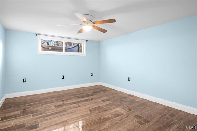 unfurnished room featuring hardwood / wood-style flooring and ceiling fan