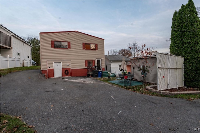 back of house with a patio area