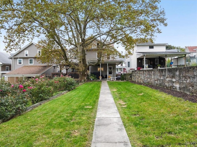 exterior space featuring a front lawn