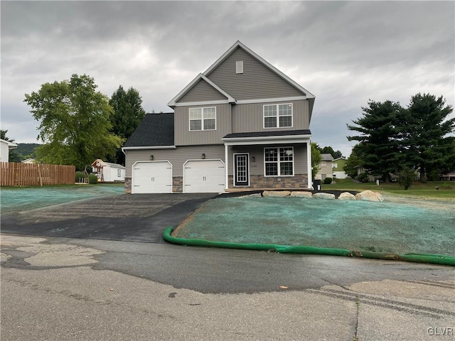 view of front of property featuring a garage