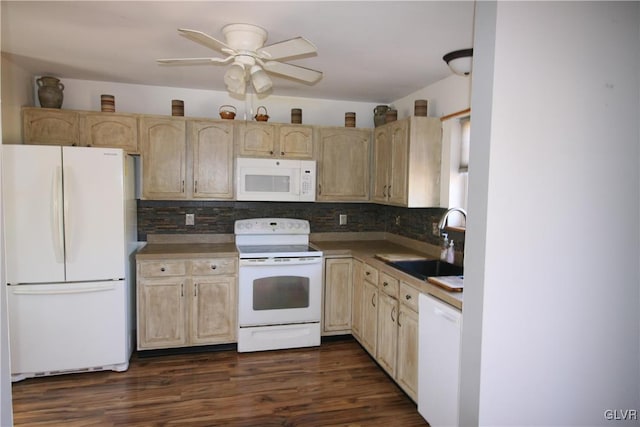 kitchen featuring light brown cabinetry, white appliances, dark hardwood / wood-style floors, and sink