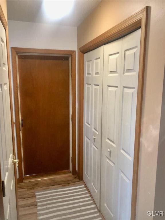 hallway featuring light hardwood / wood-style flooring