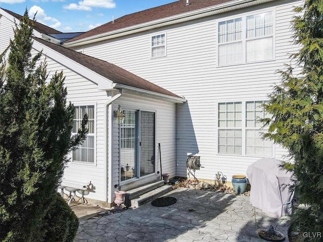 rear view of house with a patio