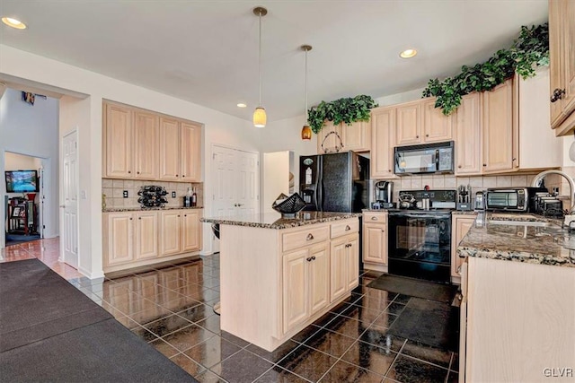 kitchen featuring decorative backsplash, dark stone counters, black appliances, decorative light fixtures, and a kitchen island