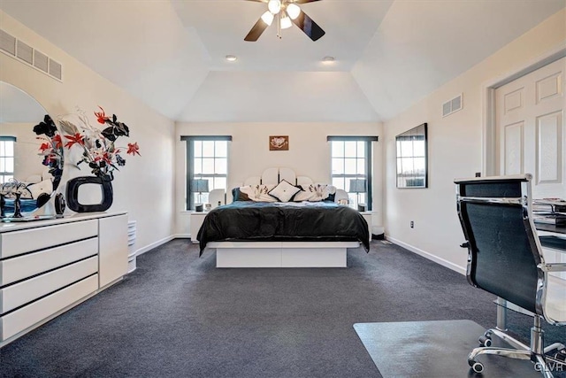 carpeted bedroom with ceiling fan and lofted ceiling