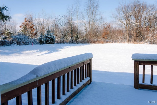 view of snow covered deck