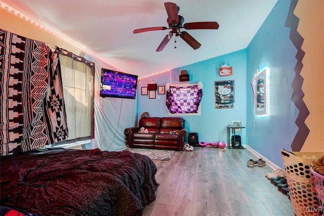 bedroom featuring hardwood / wood-style flooring and ceiling fan