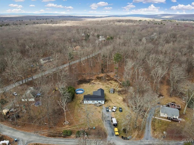 drone / aerial view featuring a mountain view