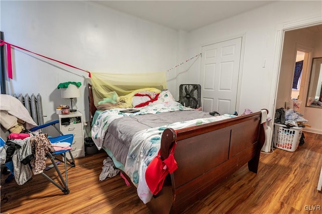 bedroom featuring hardwood / wood-style flooring