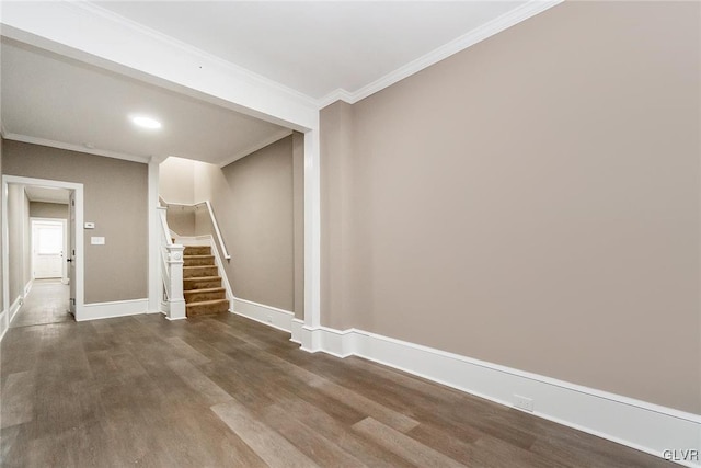 interior space with crown molding and wood-type flooring