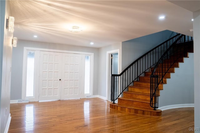 entrance foyer featuring hardwood / wood-style floors