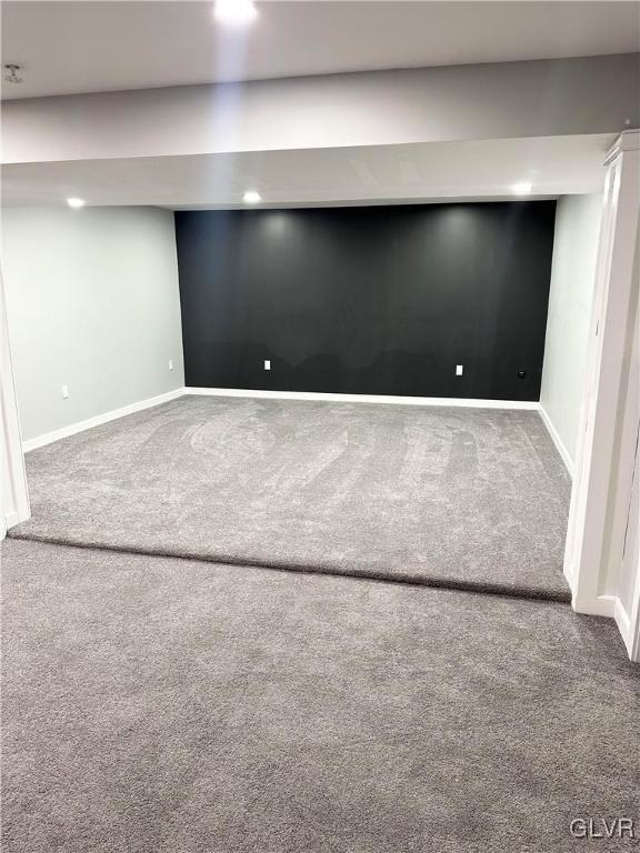 basement featuring carpet