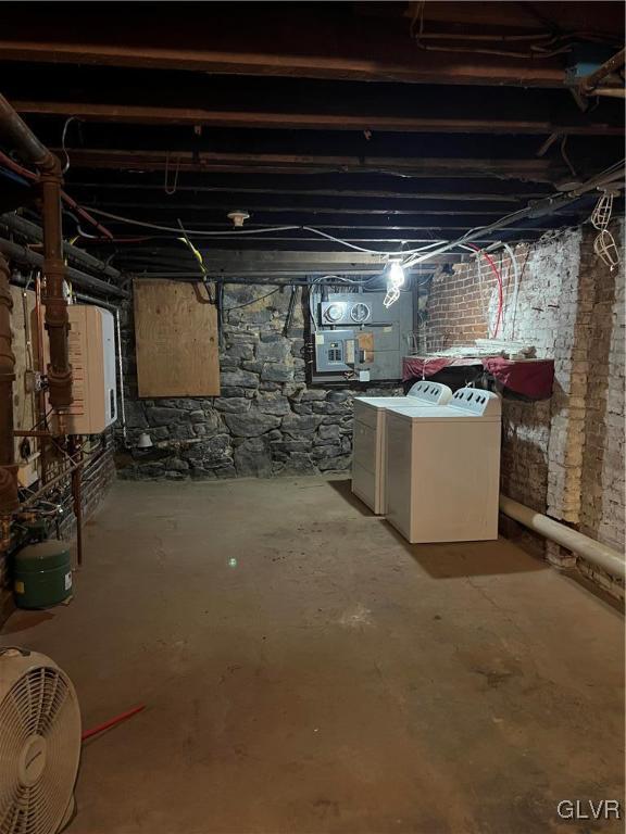 basement with separate washer and dryer