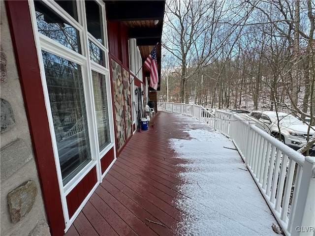 view of snow covered deck