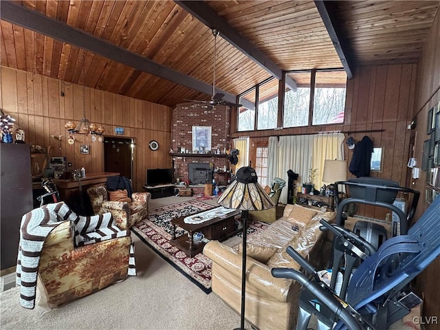 interior space with ceiling fan, beamed ceiling, wooden walls, carpet, and wood ceiling