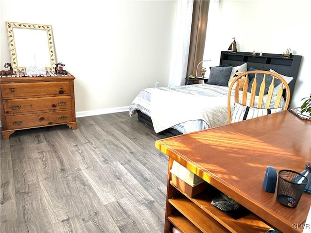 bedroom featuring hardwood / wood-style flooring