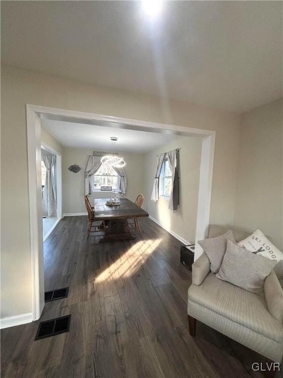 dining room featuring dark hardwood / wood-style flooring