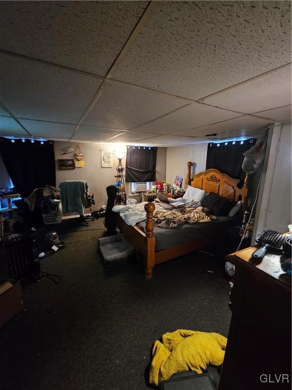 bedroom featuring a drop ceiling