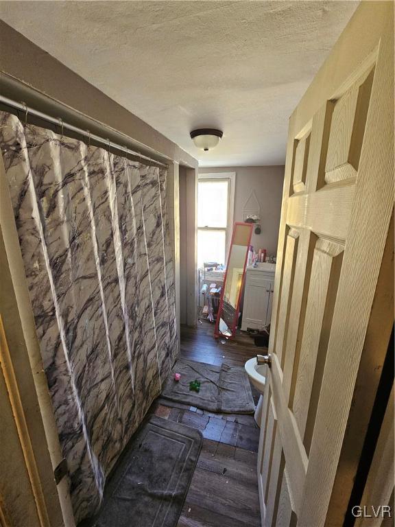 bathroom featuring hardwood / wood-style flooring