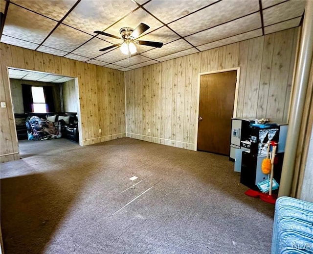 interior space with ceiling fan