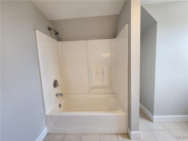 bathroom with tile patterned floors and shower / bathing tub combination