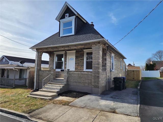 view of front of home featuring covered porch