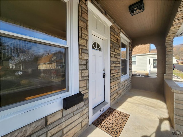 property entrance with a porch