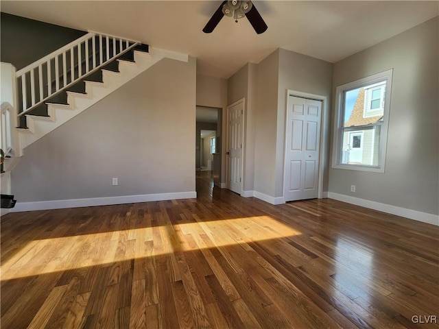 unfurnished room featuring ceiling fan and hardwood / wood-style floors