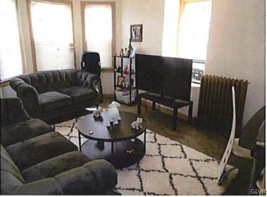 living room featuring plenty of natural light