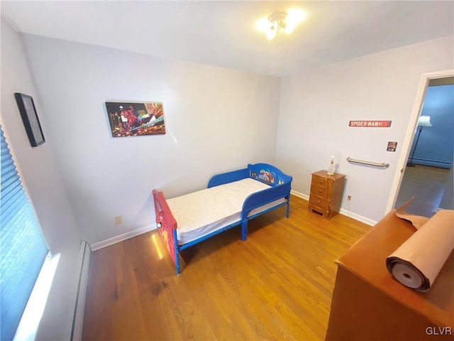 bedroom featuring hardwood / wood-style floors